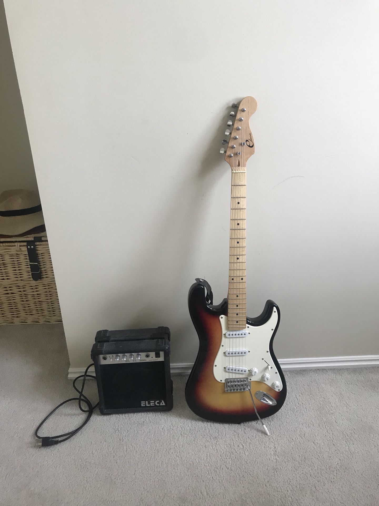 Electric guitar with amp and case