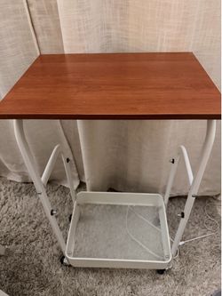 Rolling cart with wooden tabletop