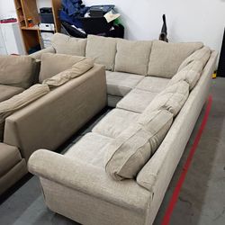 Beige tan sectional couch