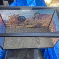 4 terrariums or tanks all in a bundle 
