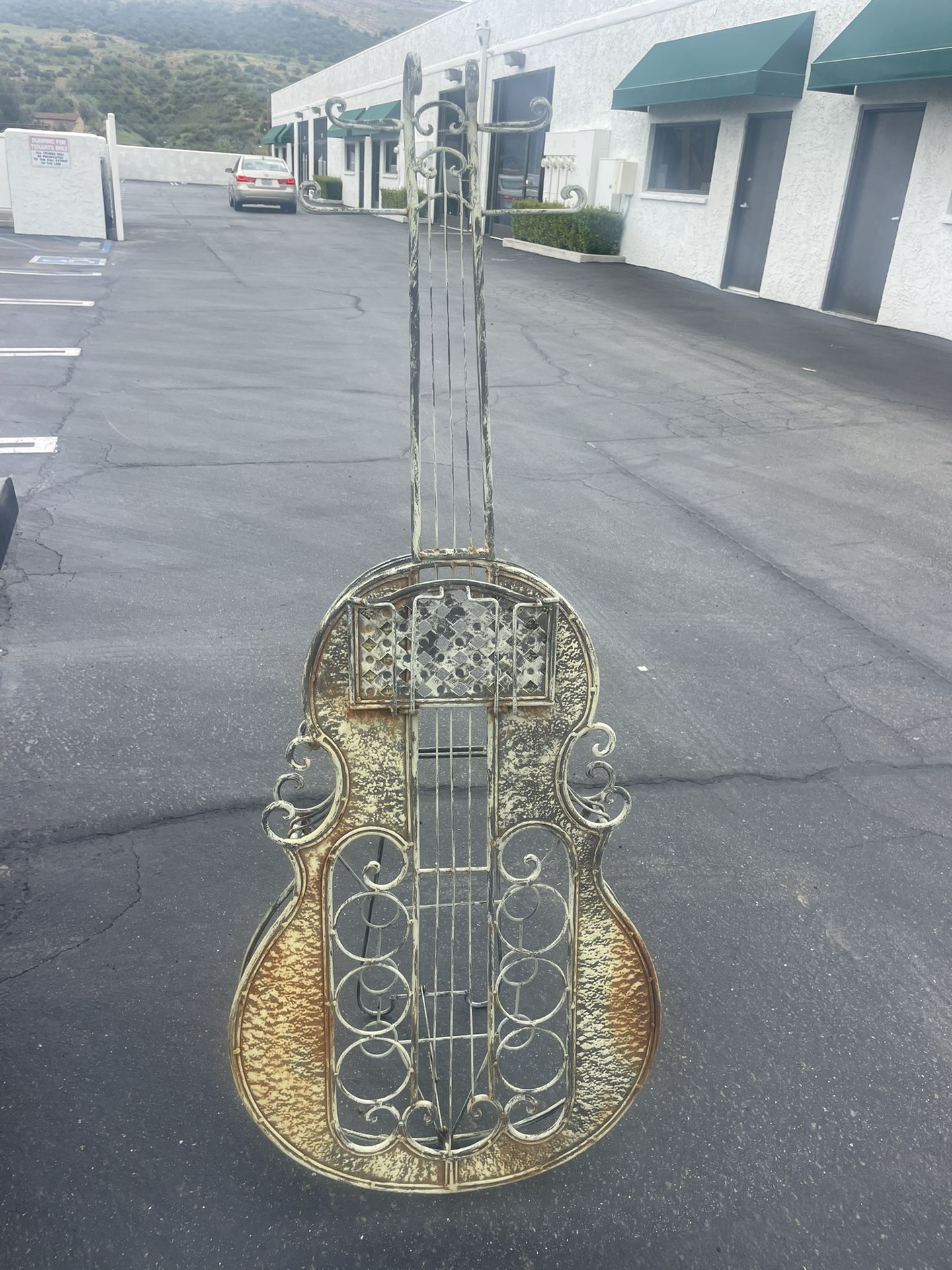 Antique. Metal Guitar.