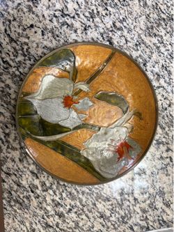 Brass plate with a lily from India