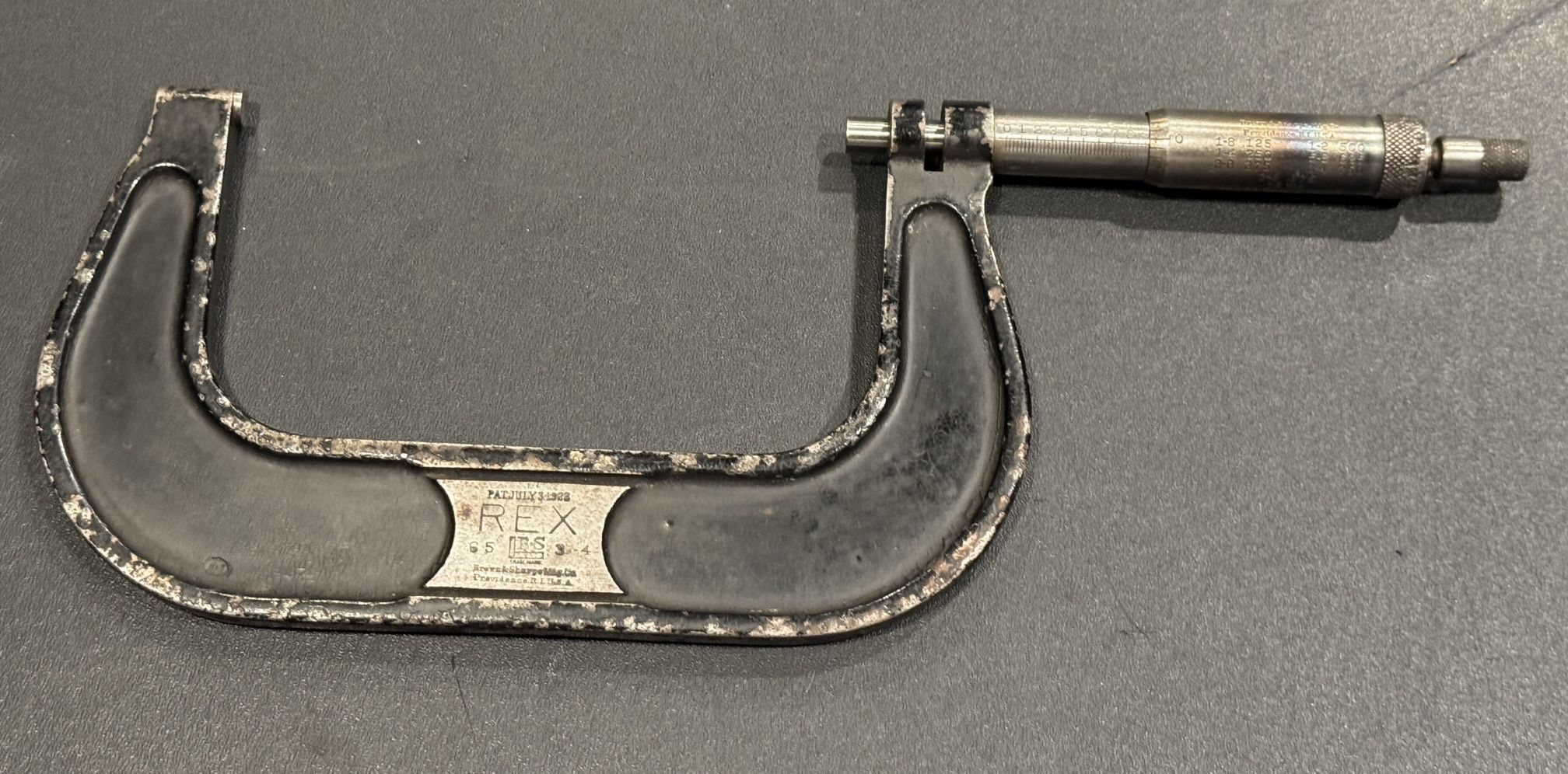 BROWN & SHARPE TOOLS REX 3”-4” OUTSIDE MICROMETER, No. 65, .001”. Patent date July 3rd 1923. Tool is in used condition.