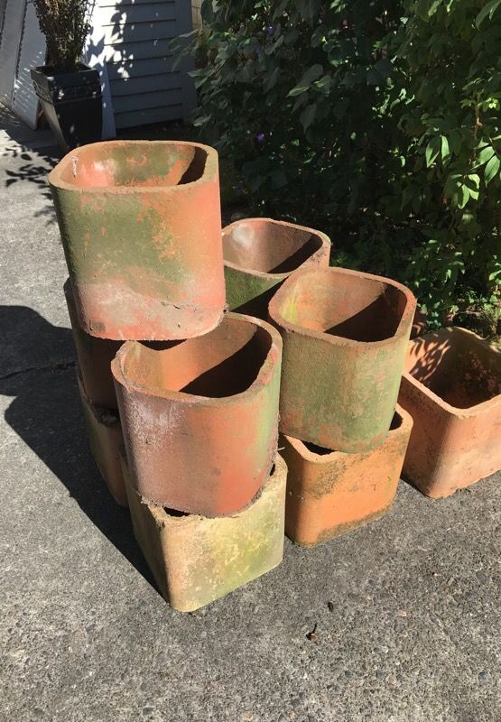 11 miscellaneous clay chimney flue liners