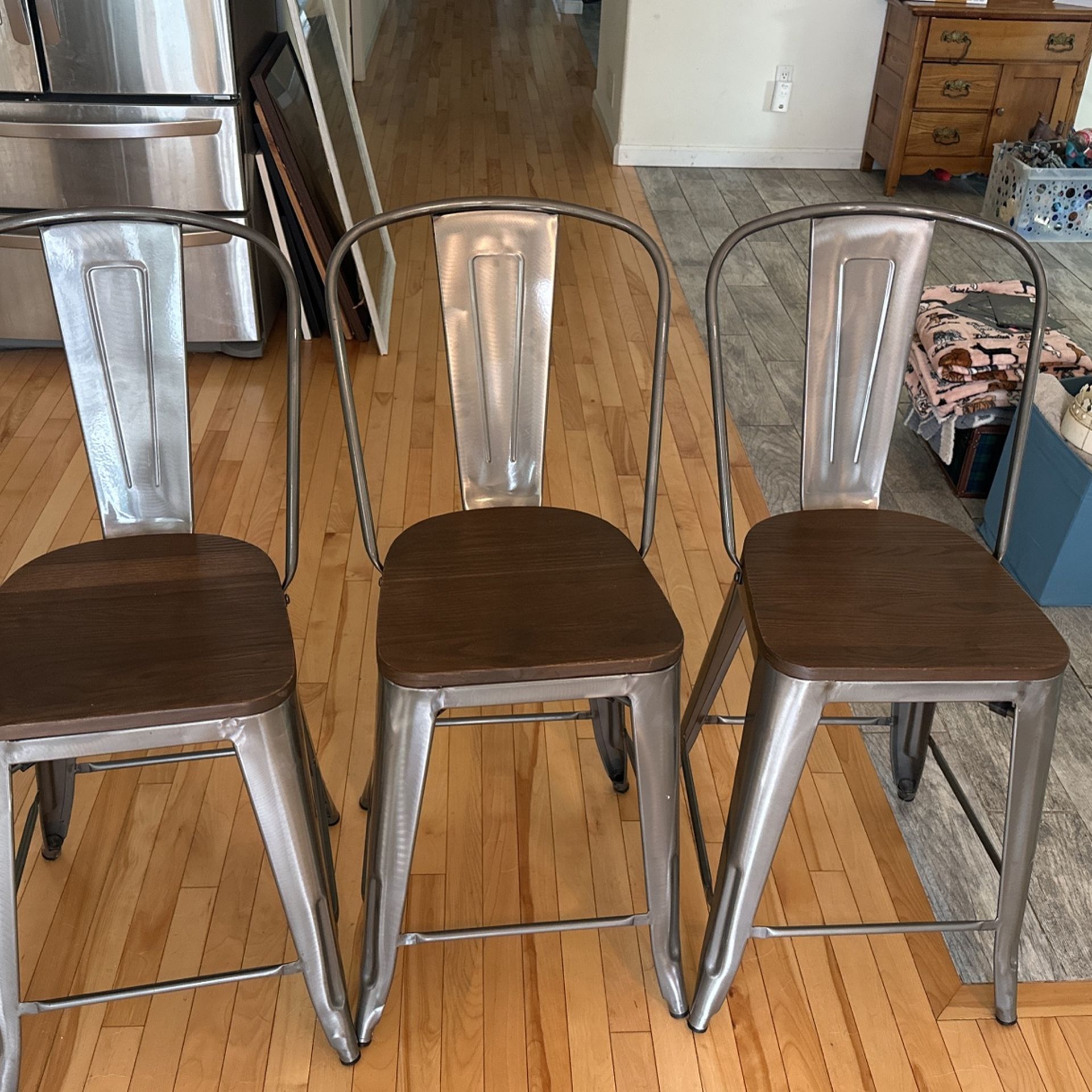 3 Counter Height Stools.