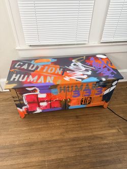 Graffiti style handpainted cabinet with two doors and two shelves