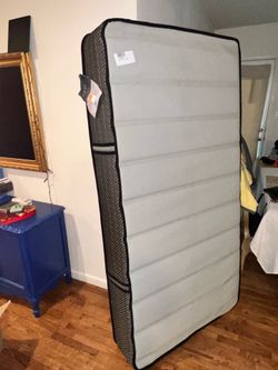 Slightly Used Twin Sealy Performance Mattress with Posturepedic Technology