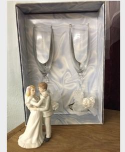 Porcelain bride and groom cake top. Bridal toasting champagne flutes. Still available