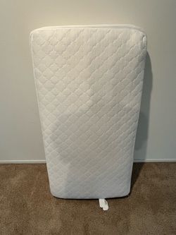 Kolcraft crib mattress + waterproof fitted pad