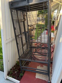Bird cage with wheels