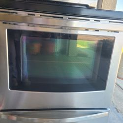 Stove with ceramic top and oven