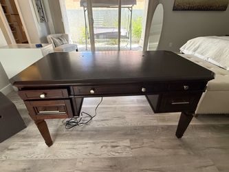 Brown wood desk credenza