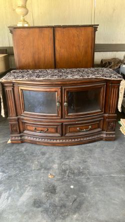 Big cabinet for TV on stand just needs to be wiped down