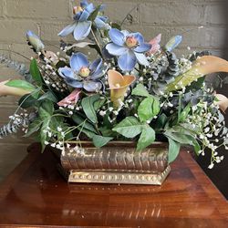 Elegant flowers in brass base