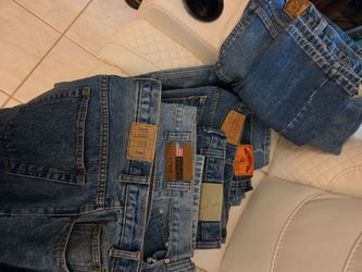 8 pair of brand name jeans