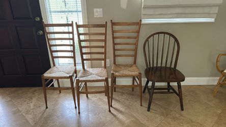 4 chairs 3 are from Italy