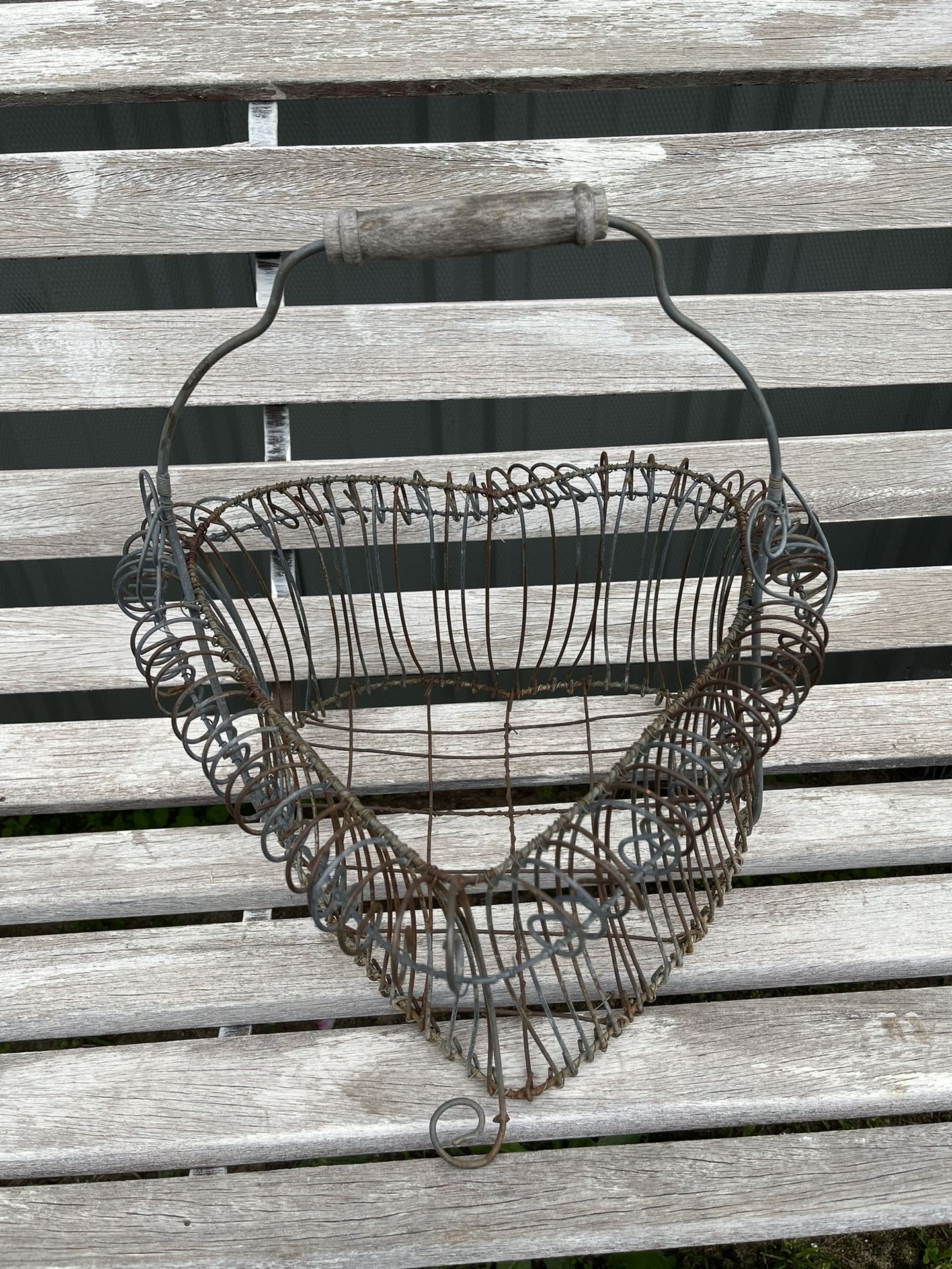 Large antique/vintage metal wire heart-shape basket, with a wooden handle