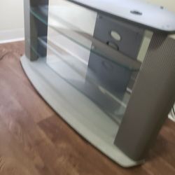 Entertainment Center 24 "Inches Tall X 47"Inches  Wide And  19 " Inches Deep With Glass Shelves 