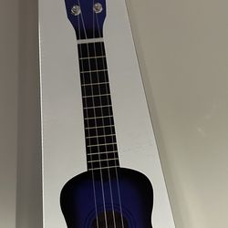 Ukulele Audster-Sunburst  Pattern New In Sealed Box  $25/OBO