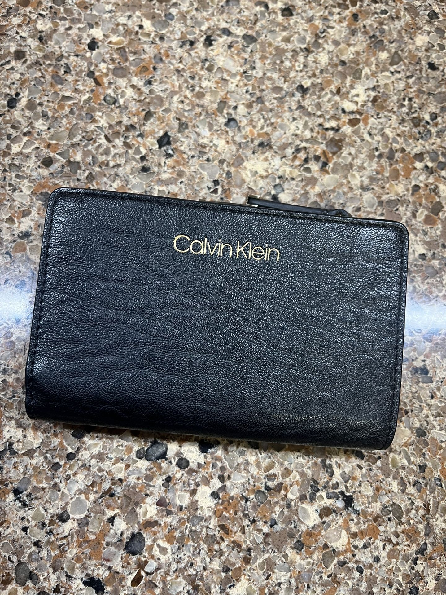 Calvin Klein compact women’s wallet black leather zippered