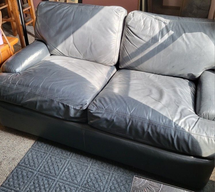 Black Leather Love Seat And Matching Chair.