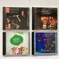 4 Preowned Christmas Music CDs Kenny G., John Tesh, Mannheim Steamroller, London Symphony 