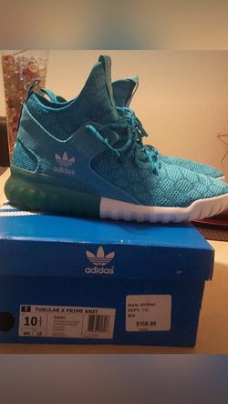 Adidas tubular worn once.