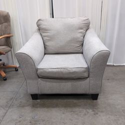 Light Grey Upholstered Armchair with Piped Edges