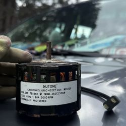 NuTone replacement motor for a bathroom exhaust fan. The model number is JA1C155K#.