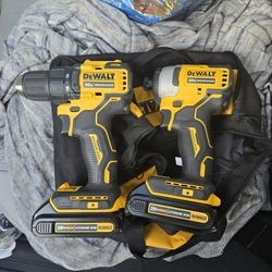 Dewault brand new 1/4 impact Batteries And 1/2 driver And bag