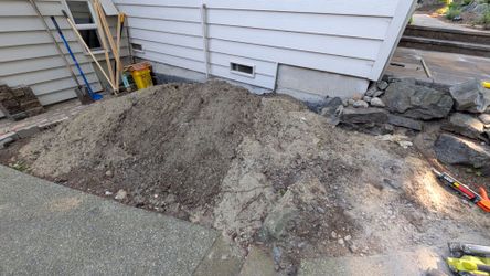 2 yards of mixed soil and rock fill/ you haul