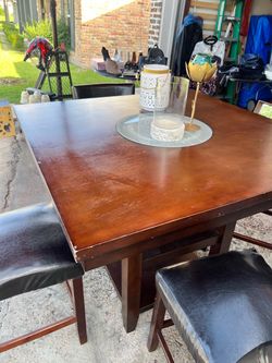 Wood Dining Table with Black Chairs