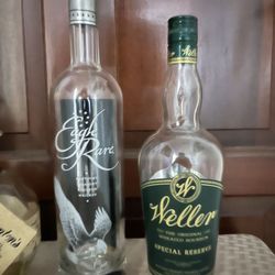 Empty Bourbon Bottles And Stoppers