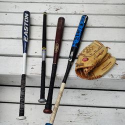 Baseball Bats And Pitchers Glove