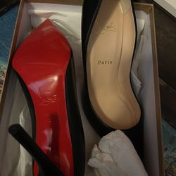 Black louboutin pumps