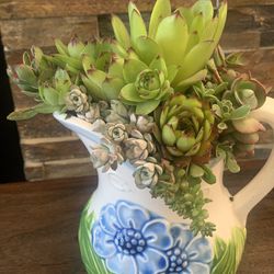 Succulent Arrangement In Blue Flower Vase