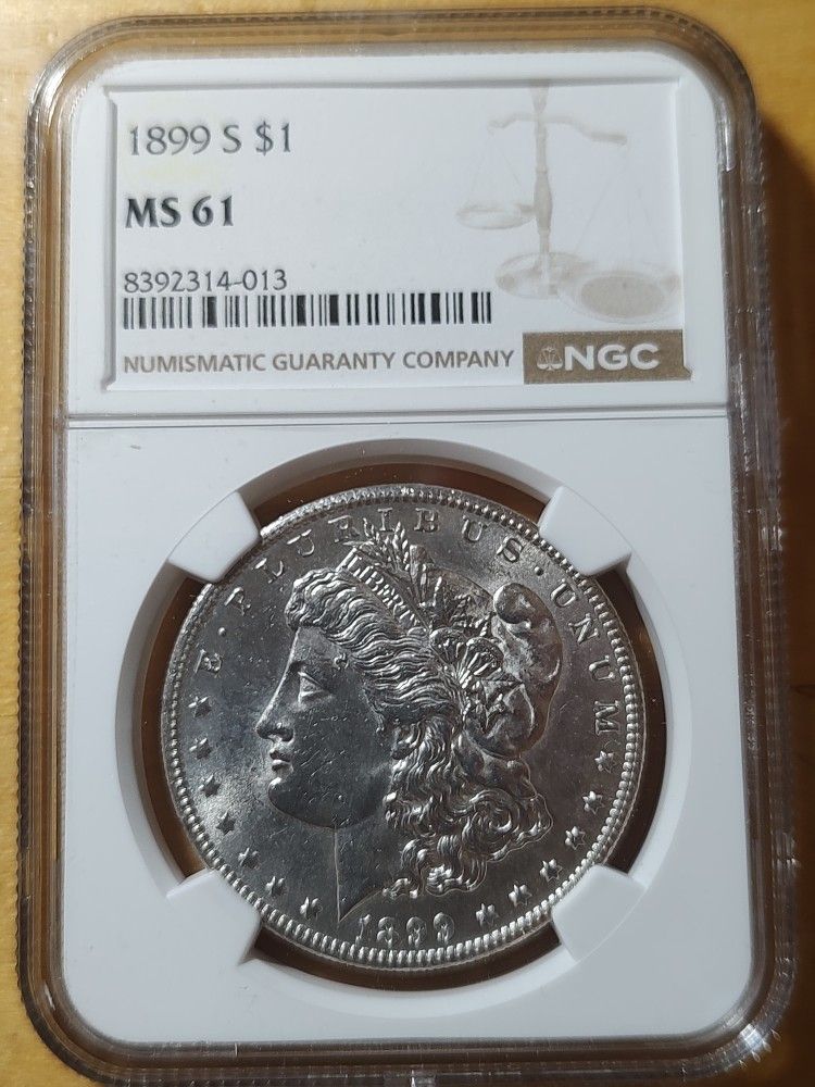 1899 - S, Morgan Silver Dollar.         MS 61