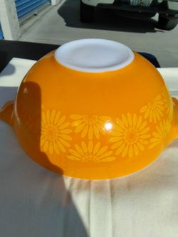 Pyrex orange with yellow daisy  pattern