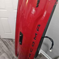 Tacoma tailgate with camera harness