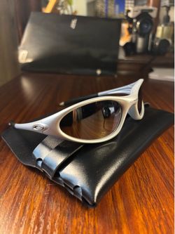 Oakley silver sunglasses