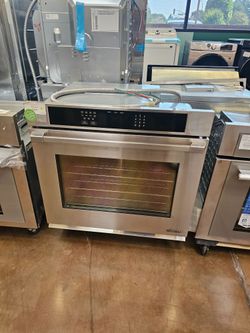 Dacor 30 inch wide stainless steel wall oven with convection fan