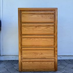 Tall solid wood dresser