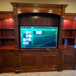 Sony 4k TV with Ethan Allen Entertainment Center