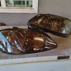 01 Civic Headlight Asked For $35Obo 