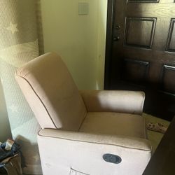 Pink Rocking Chair And Nursery Rug