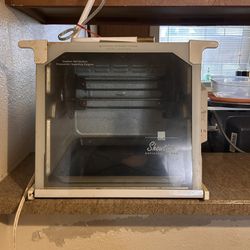 SHOWTIME ROTISSERIE & BBQ