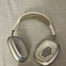 Apple AirPods Max headphones in silver. 