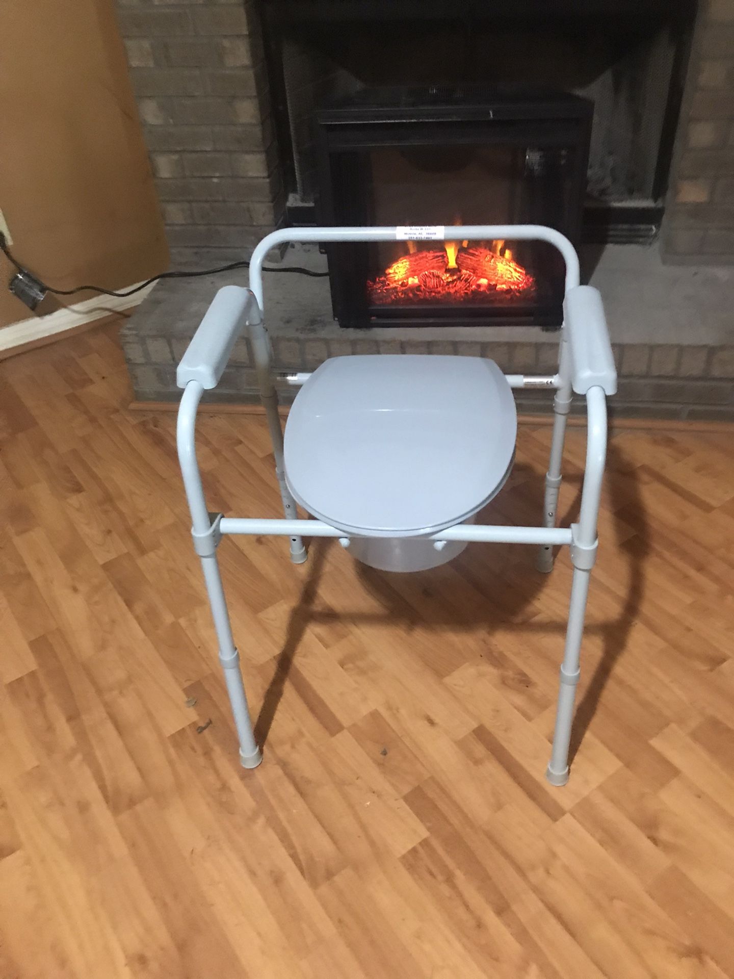 BRAND NEW PORTABLE TOILET/Height Adjustable