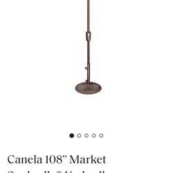 Sunbrella 9’ Brand New.  $90 OBO.  Pick Up Only  Aruba Blue.  Stand Not Included. 