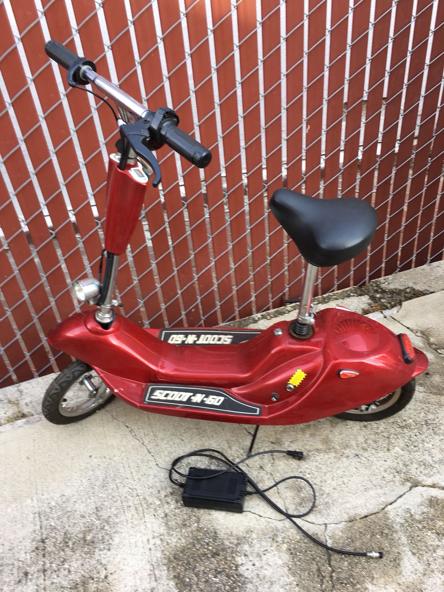 Scoot-n-Go electric scooter with charger and key